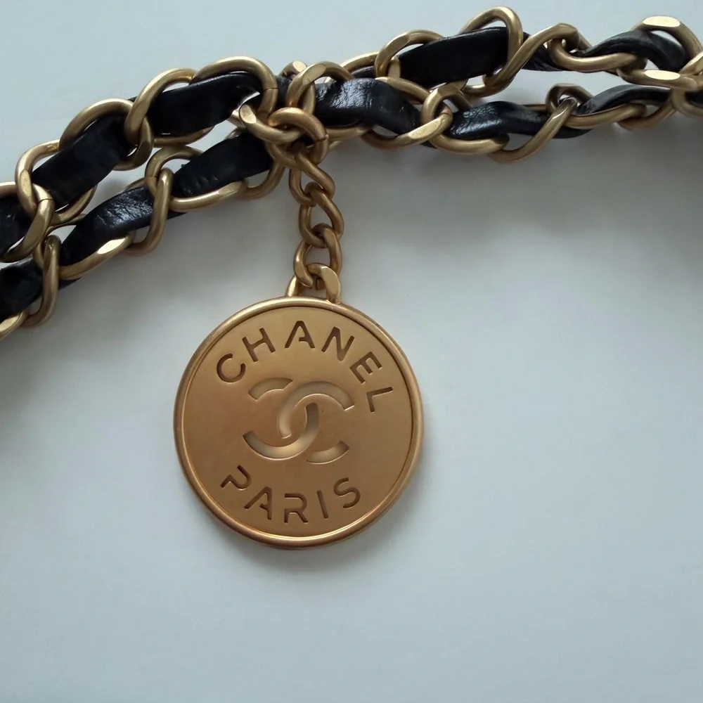 Black Quilted Shoulder Bag with Gold Accents - Picture 2 of 9